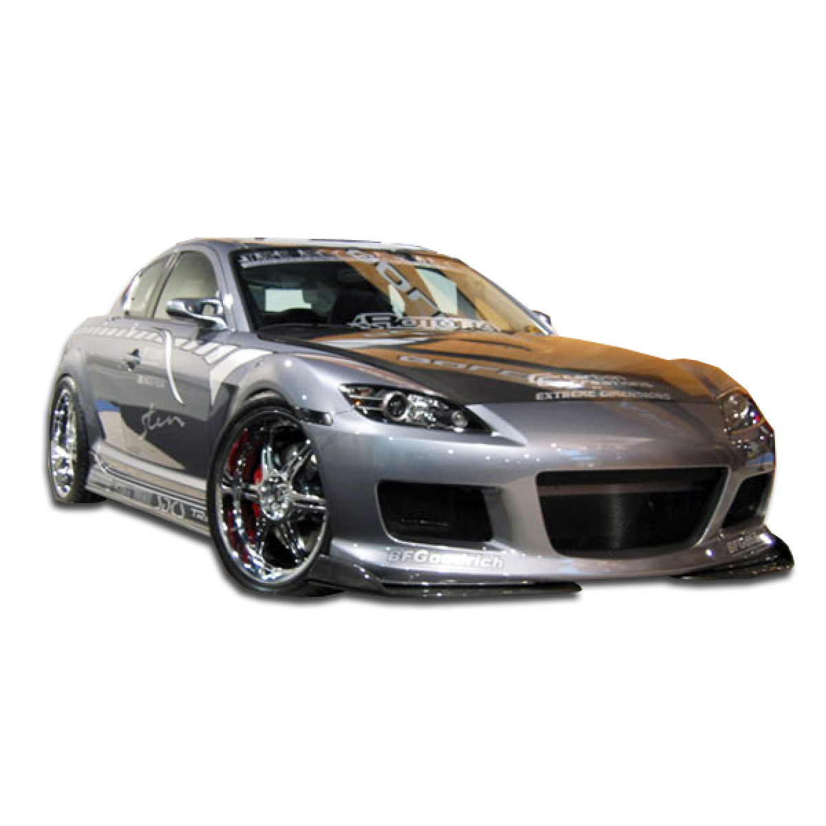 Modify your Mazda RX-8 2004 with our Exterior/Complete Body Kits - Front angle view of a modified car