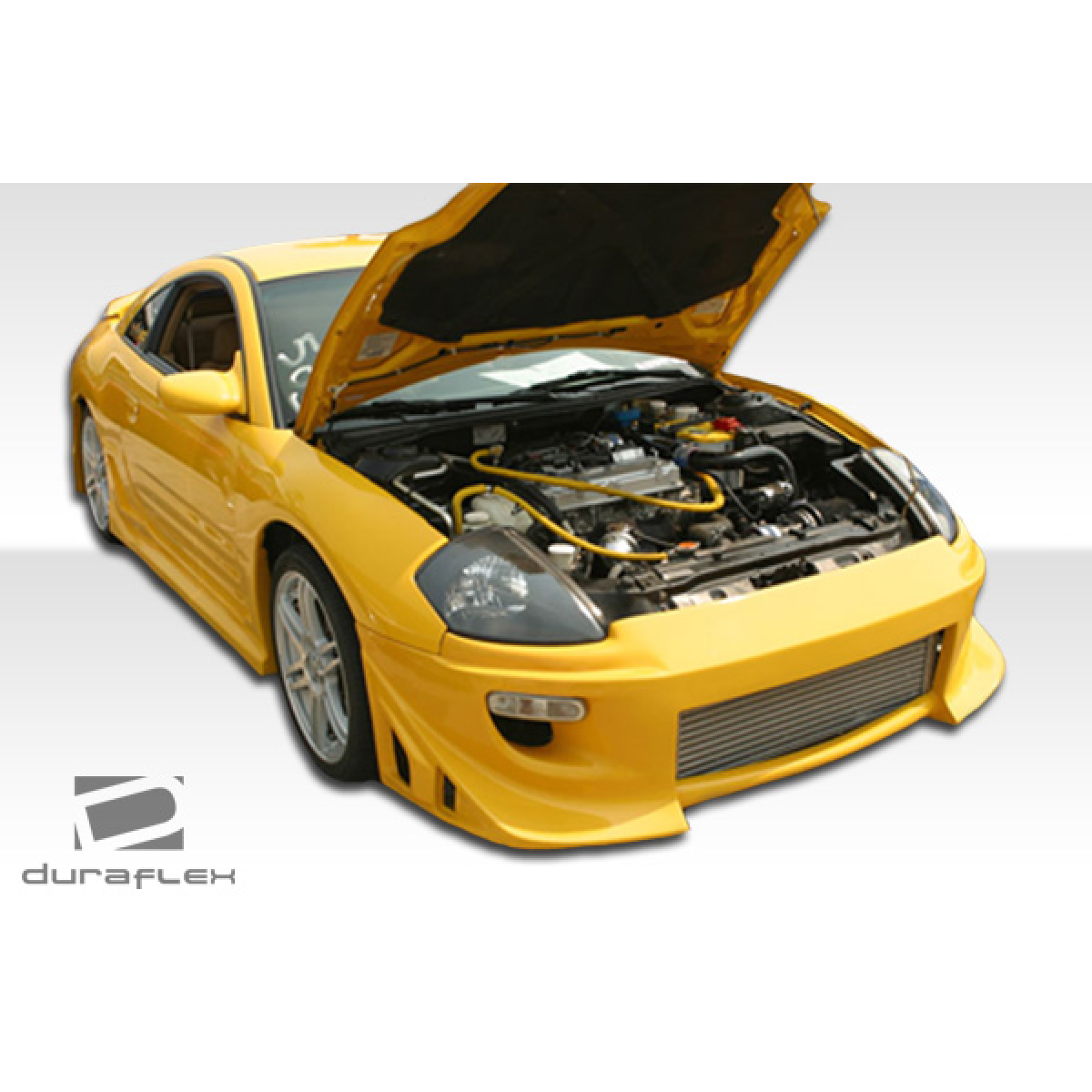 Modify your Mitsubishi Eclipse 2000 with our Exterior/Complete Body Kits - Front three quarter view of a yellow car engine