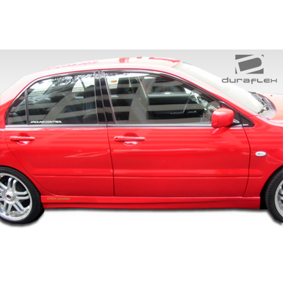 Modify your Mitsubishi Lancer 2002 with our Exterior/Complete Body Kits - Side view of the red Mitsubishi Lancer body kit