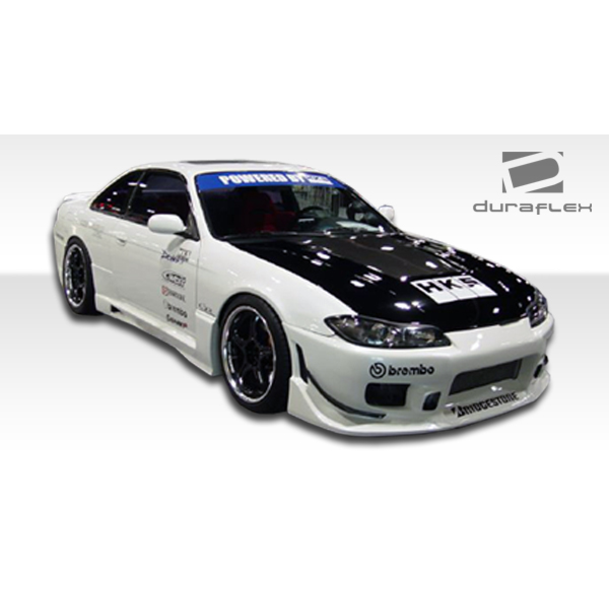 Modify your Nissan 240SX 1995 with our Exterior/Complete Body Kits - Front three quarter angle view of the vehicle