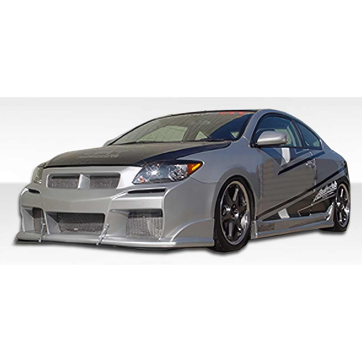 Modify your Scion tC 2005 with our Exterior/Complete Body Kits - Car viewed from a slight front angle