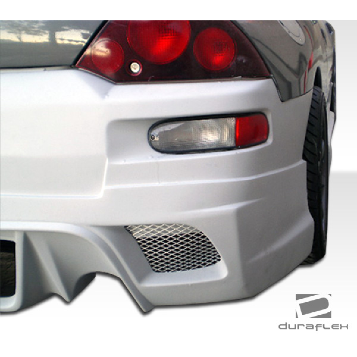 Modify your Mitsubishi Eclipse 2000 with our Exterior/Complete Body Kits - Angle shows rear view of body kit component