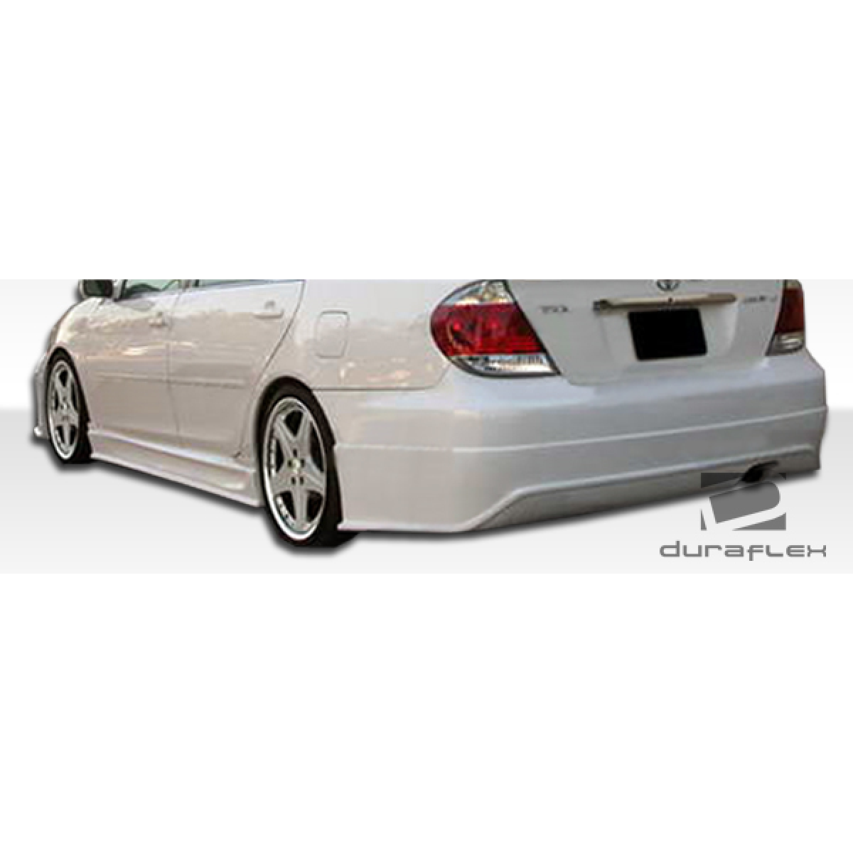 Modify your Toyota Camry 2002 with our Exterior/Complete Body Kits - Angle shows rear three quarter view of the vehicle
