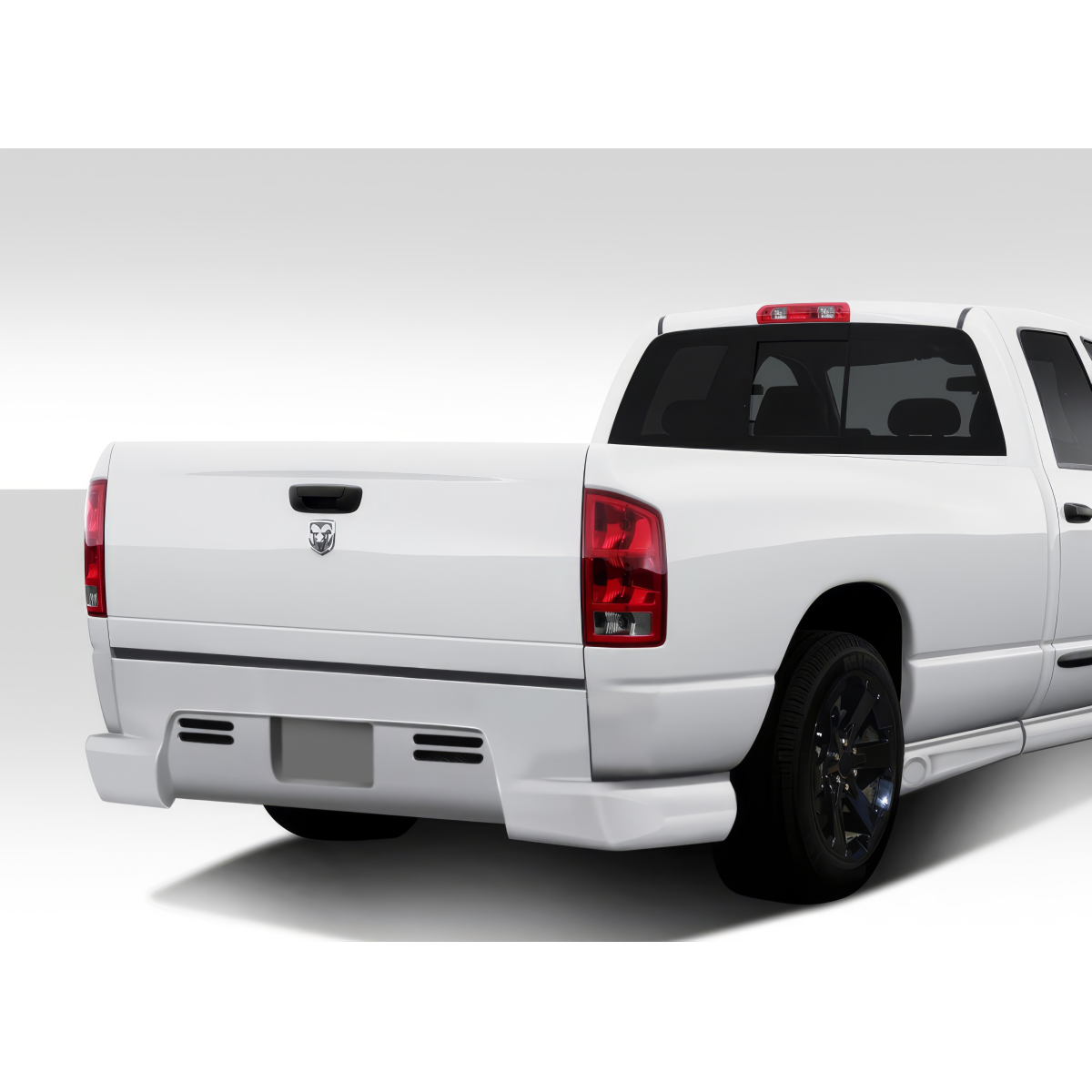 Modify your Dodge Ram 2002 with our Exterior/Rear Bumpers or Lips - Rear three quarter angle of the vehicle