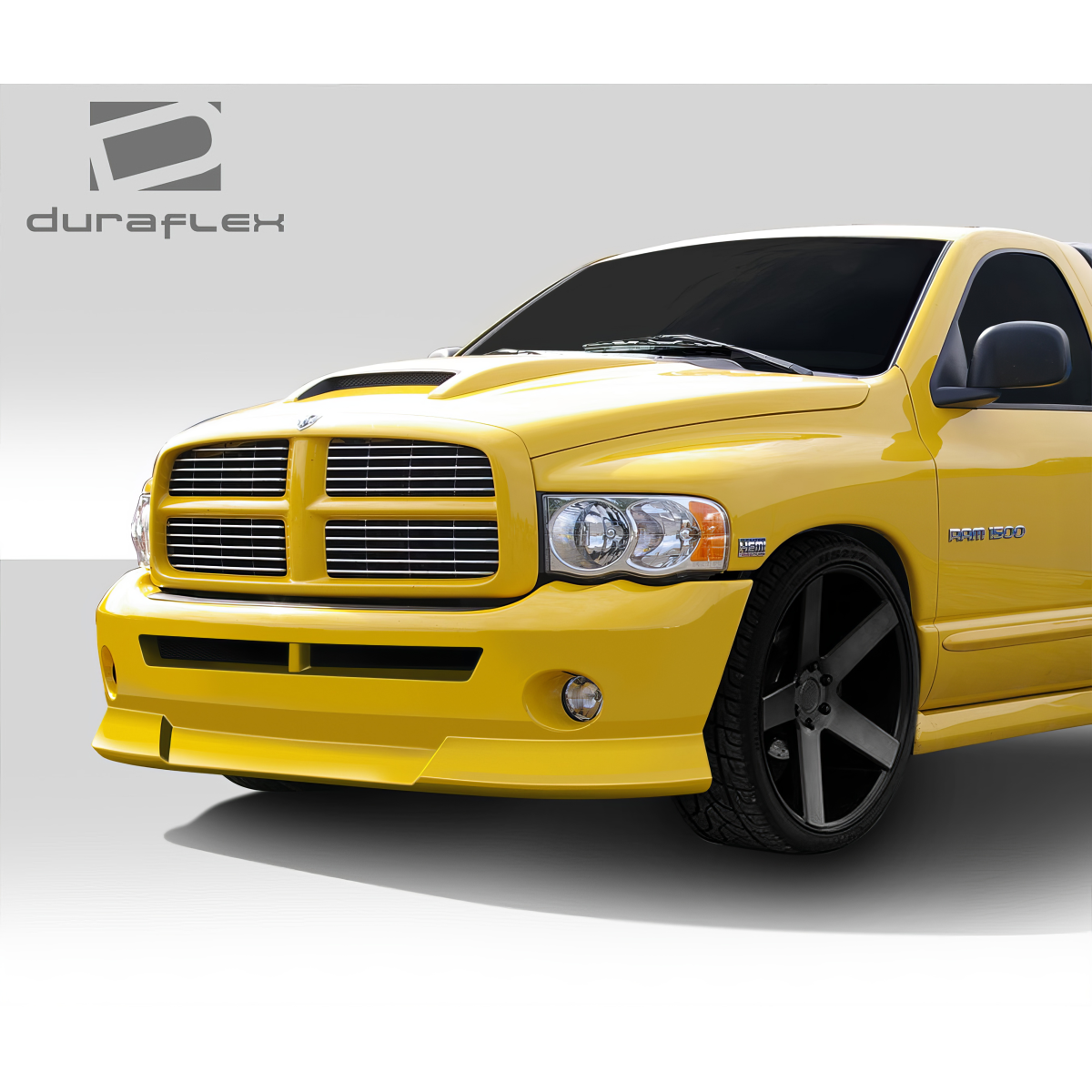 Modify your Dodge Ram 2002 with our Exterior/Front Bumpers or Lips - Front angled view of a yellow Dodge Ram