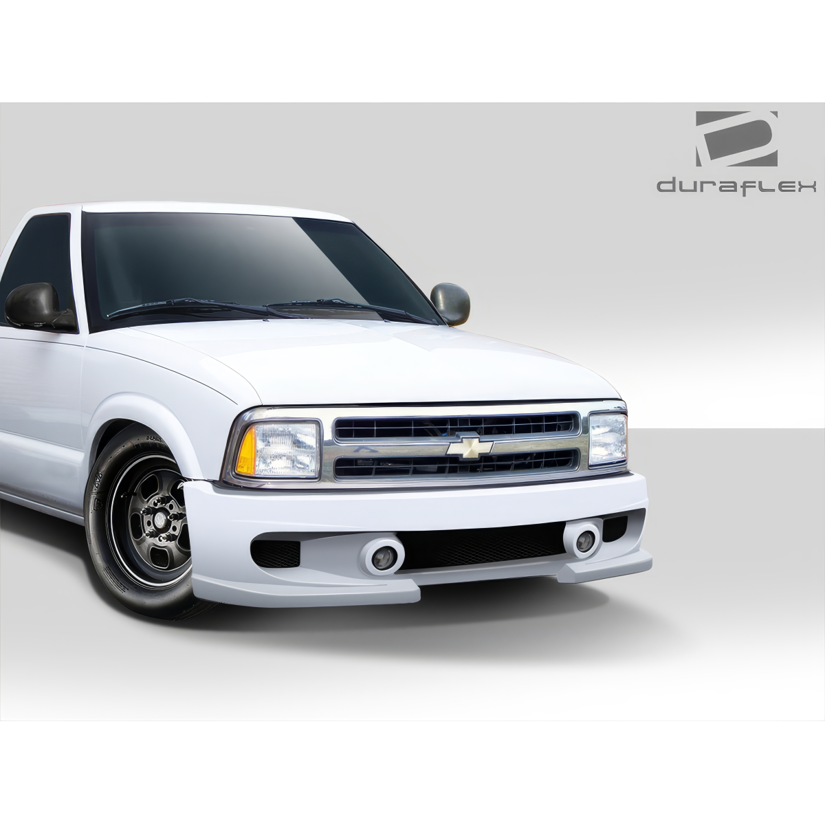 Modify your Chevrolet Blazer 1994 with our Exterior/Front Bumpers or Lips - Front angle view of a white Chevrolet Blazer