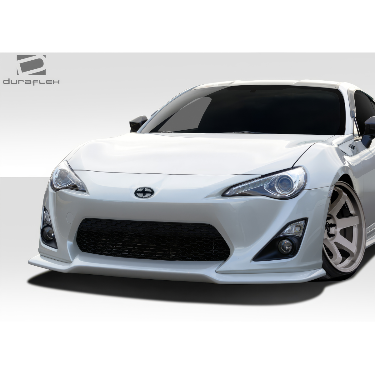 Modify your Scion FR-S 2013 with our Exterior/Front Bumpers or Lips - Front view at a slight angle from the side