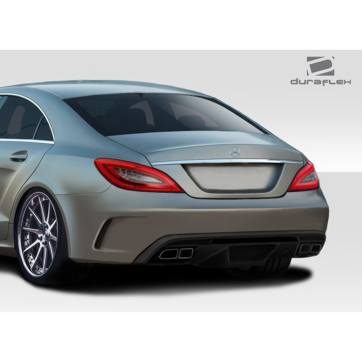 Modify your Mercedes-Benz CLS-Class 2006 with our Exterior/Rear Bumpers or Lips - Rear three quarter angle of the vehicle