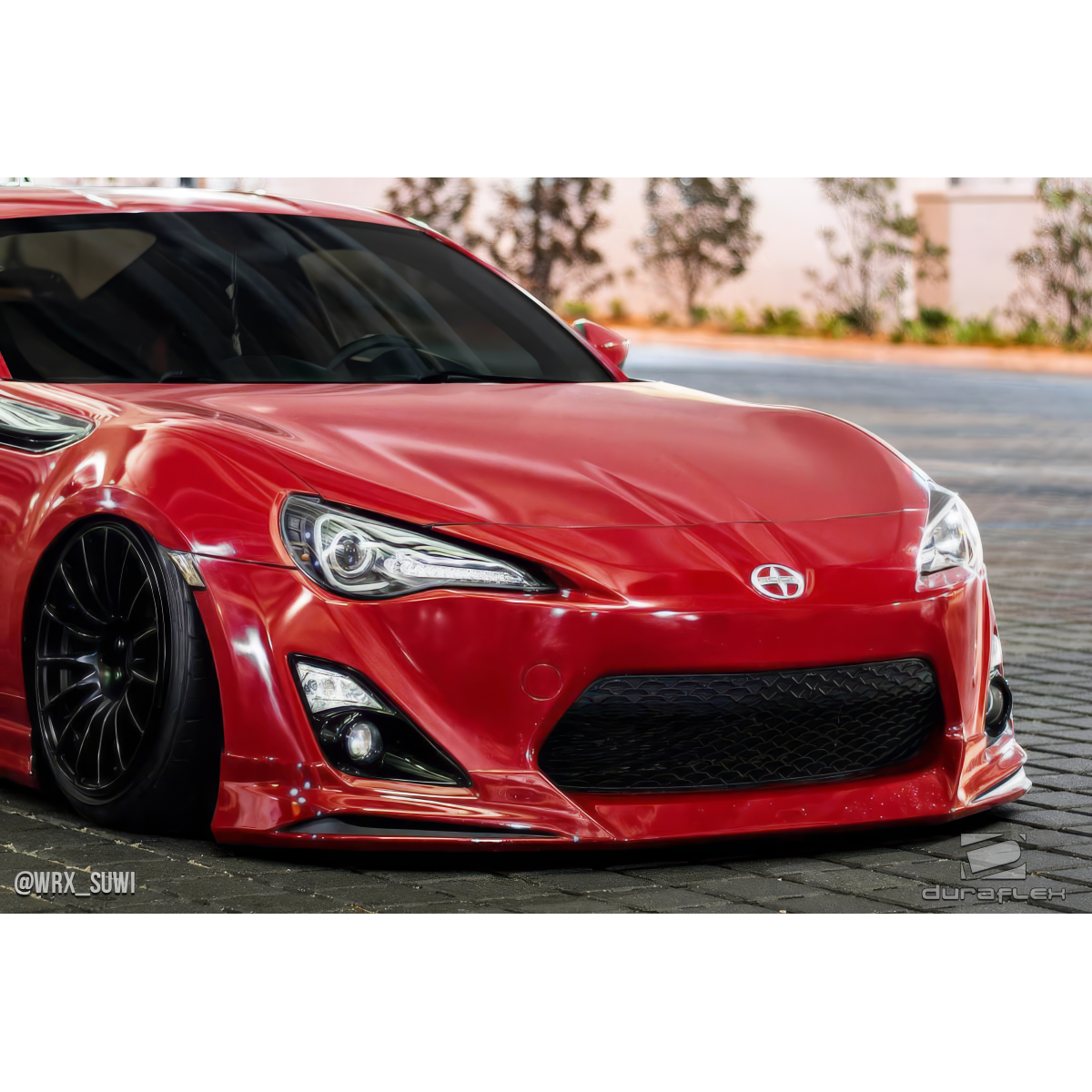 Modify your Scion FR-S 2013 with our Exterior/Complete Body Kits - Front angle showcasing the vehicle's front lip design