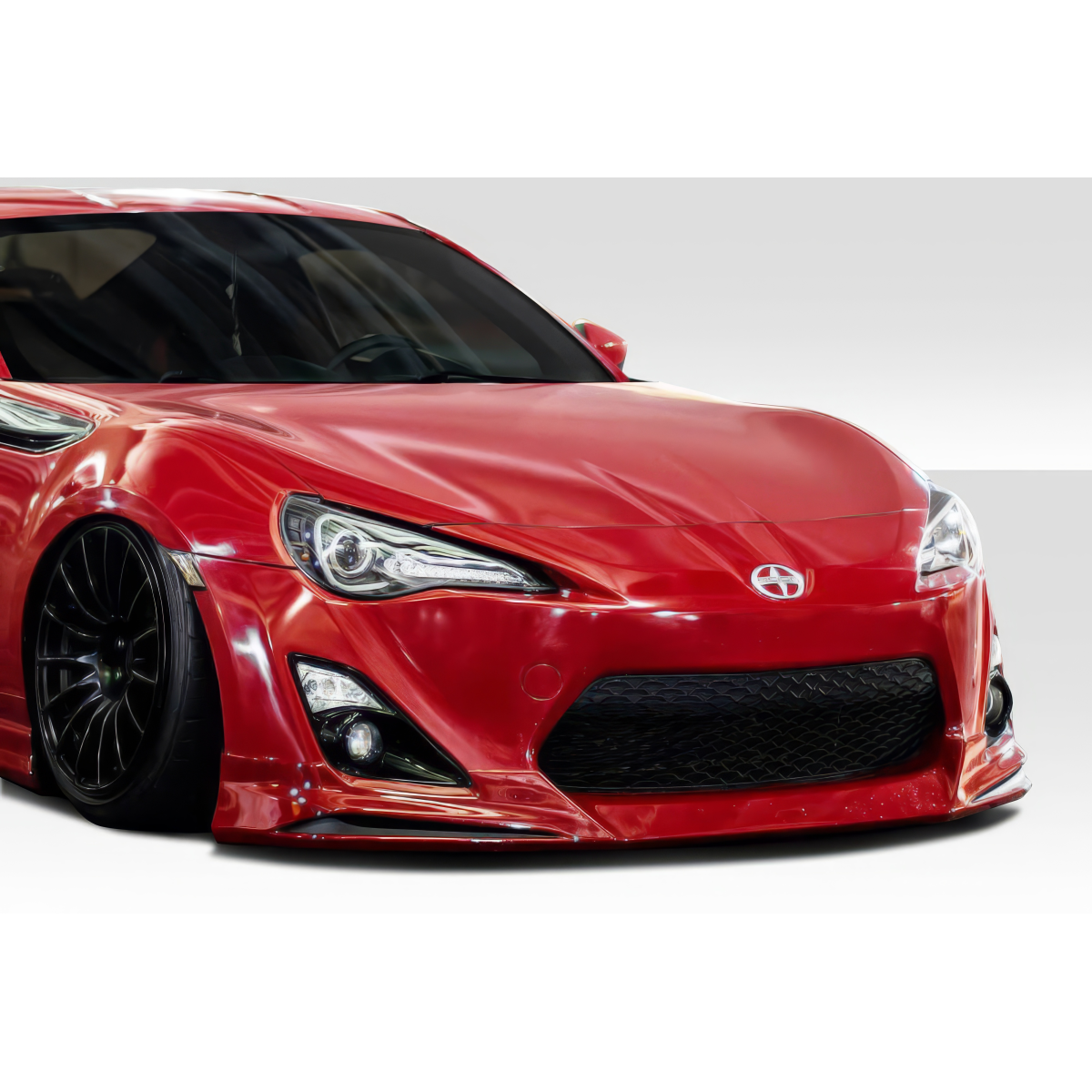 Modify your Scion FR-S 2013 with our Exterior/Complete Body Kits - Front angle view of a car part and vehicle