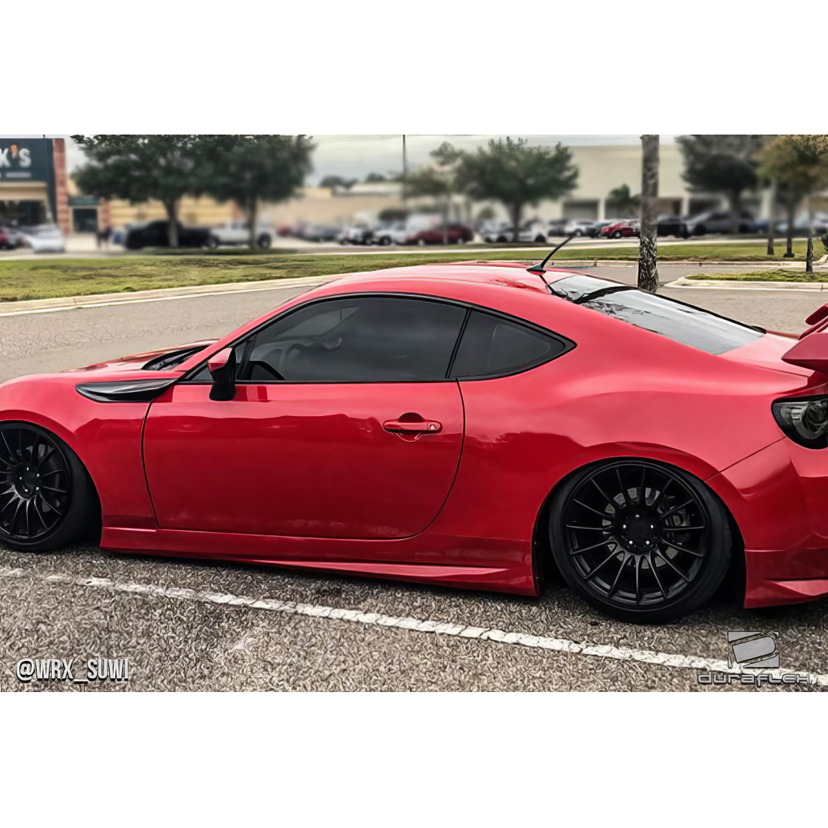 Modify your Subaru BRZ 2013 with our Exterior/Side Skirts - Side view of the vehicle at a slight angle