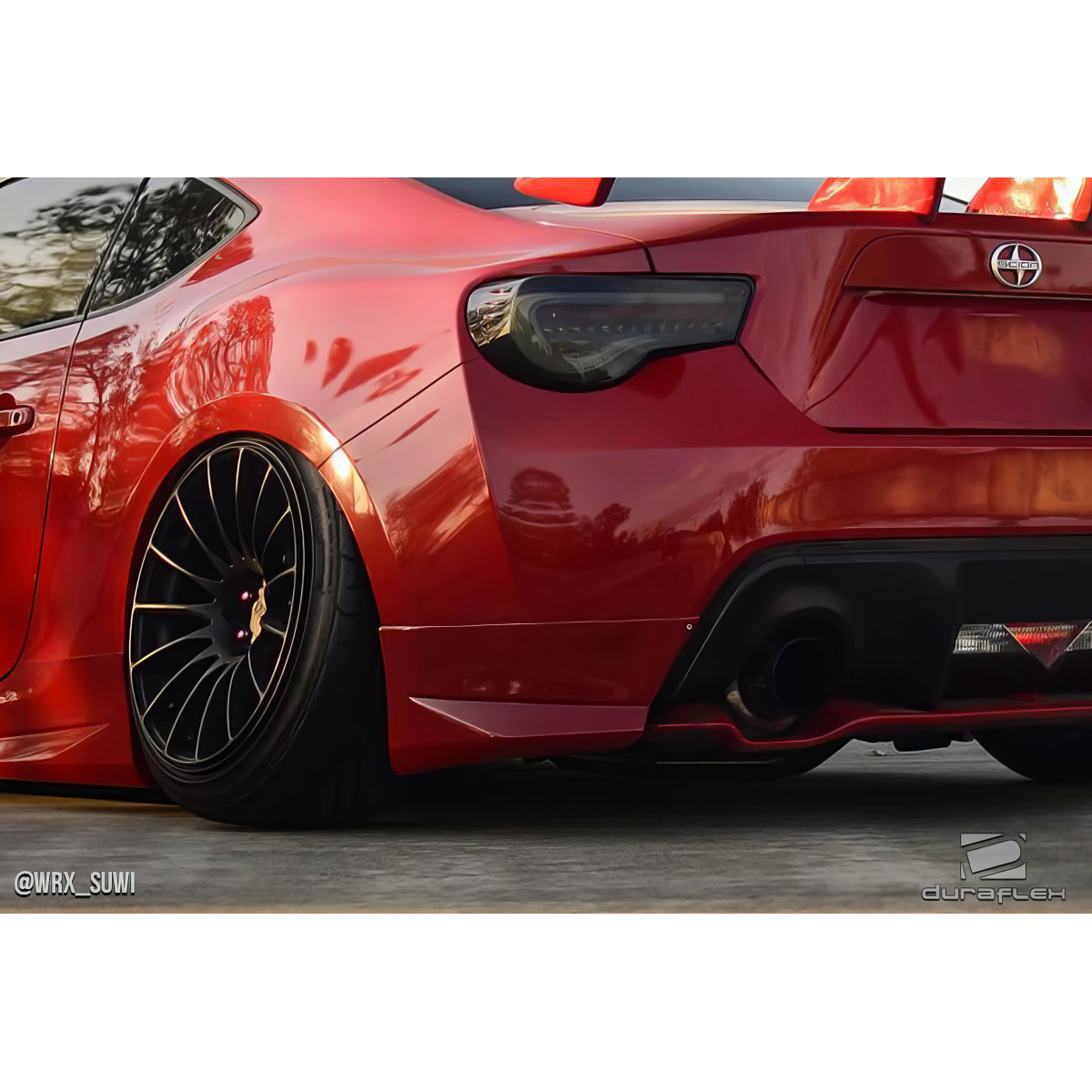 Modify your Scion FR-S 2013 with our Exterior/Complete Body Kits - Rear angle showcasing a modified red Subaru BRZ