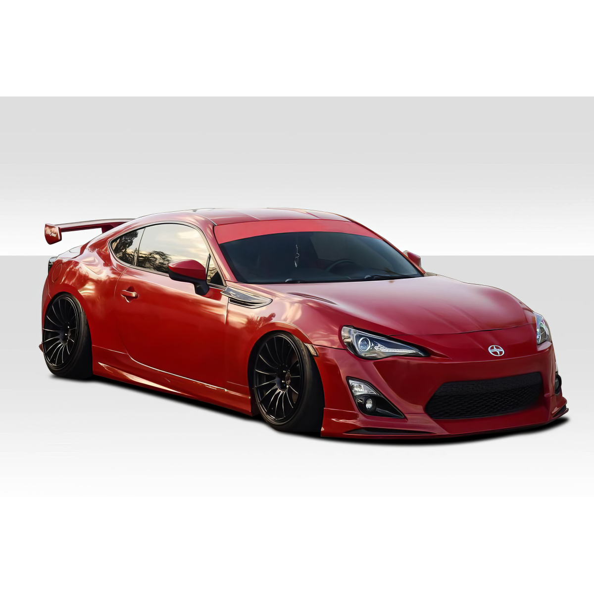 Modify your Scion FR-S 2013 with our Exterior/Complete Body Kits - Front angle view of a modified car