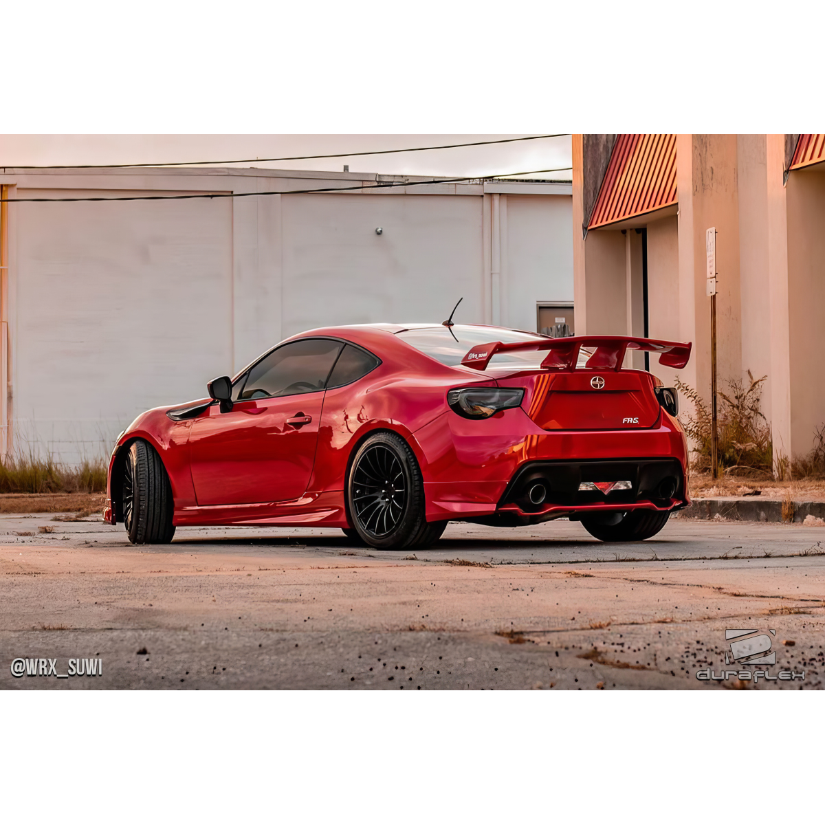 Modify your Scion FR-S 2013 with our Exterior/Complete Body Kits - The image shows a rear angle view of the vehicle