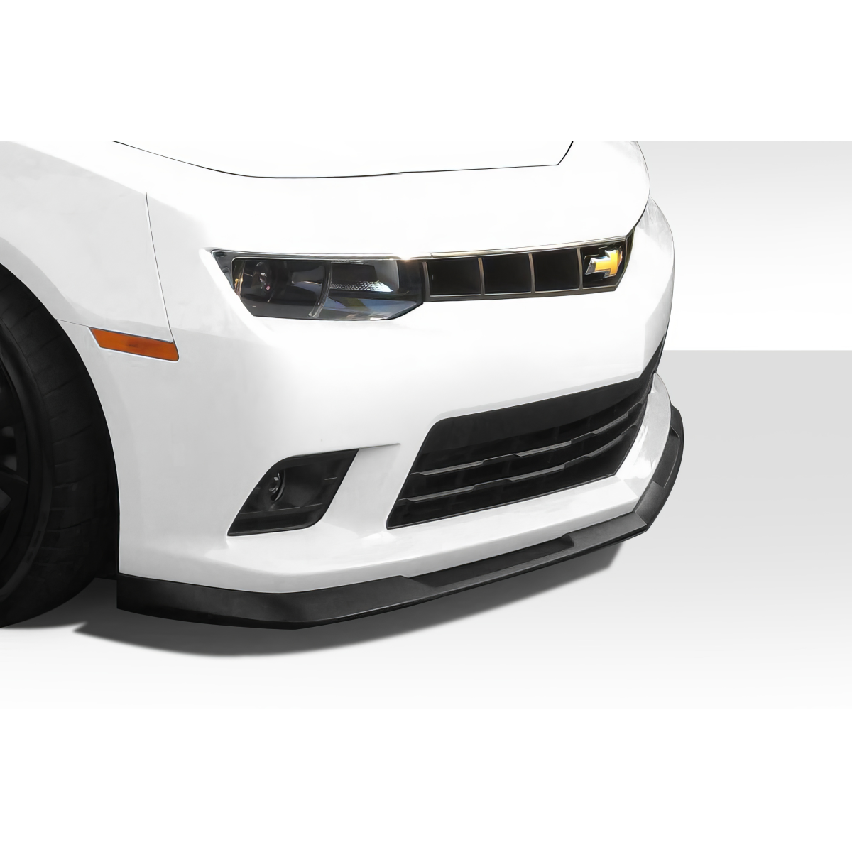 Modify your Chevrolet Camaro 2014 with our Exterior/Front Bumpers or Lips - Front view at a low angle of vehicle part