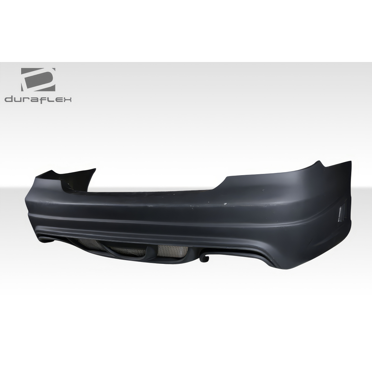 Modify your Mercedes-Benz E55 AMG 2003 with our Exterior/Rear Bumpers or Lips - Side view angle of the rear bumper part