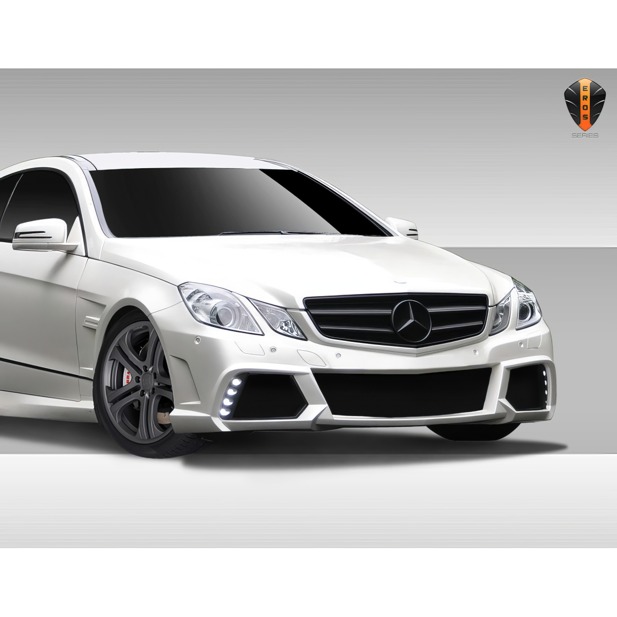 Modify your Mercedes-Benz E-Class 2010 with our Exterior/Front Bumpers or Lips - Three quarter front view of the vehicle