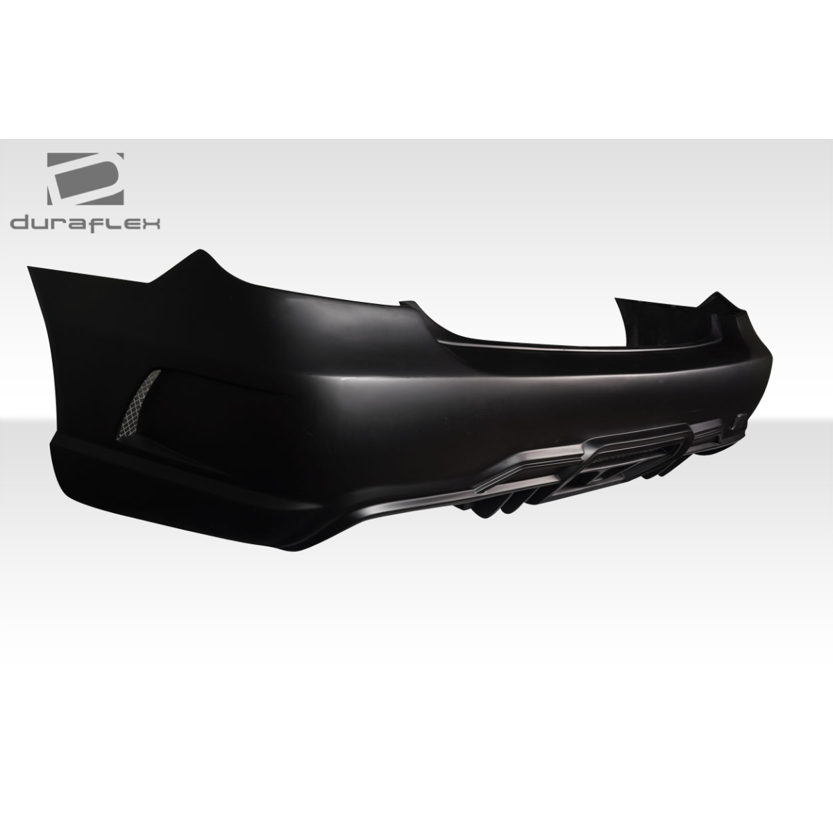 Modify your Mercedes-Benz E-Class 2010 with our Exterior/Rear Bumpers or Lips - Side angle of rear bumper view