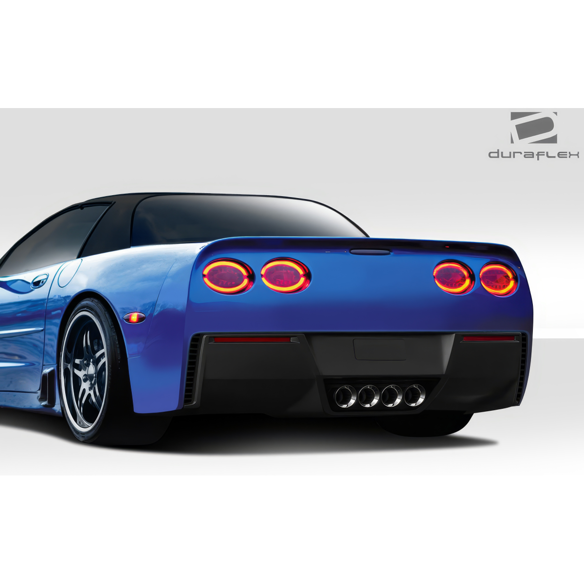 Modify your Chevrolet Corvette 1997 with our Exterior/Rear Bumpers or Lips - Rear angle showcasing blue Chevrolet Corvette C5