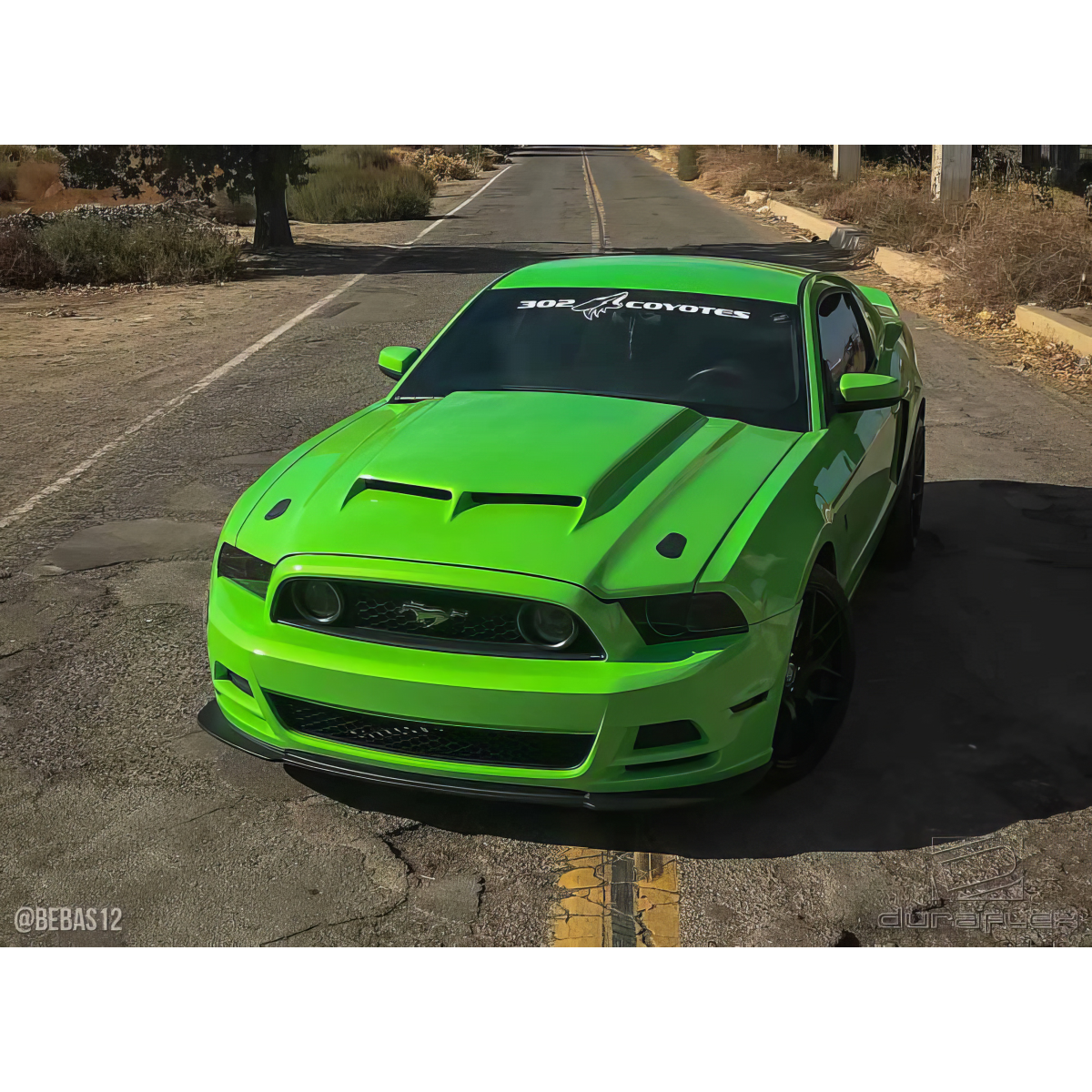 Modify your Ford Mustang 2013 with our Exterior/Hoods - Front angled view of the vehicle