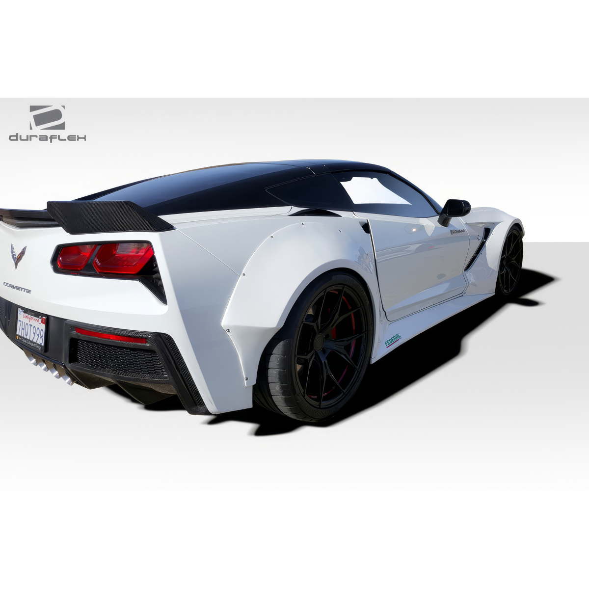 Modify your Chevrolet Corvette 2014 with our Exterior/Complete Body Kits - Rear three quarter angle view of the vehicle