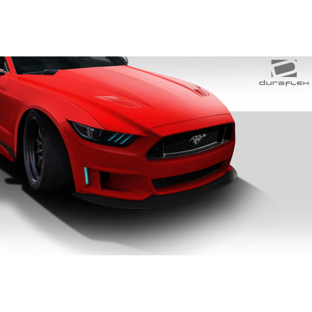 Modify your Ford Mustang 2015 with our Exterior/Front Bumpers or Lips - Front angle view of bumper on red Mustang