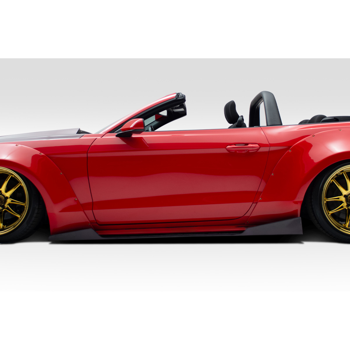 Modify your Ford Mustang 2015 with our Exterior/Side Skirts - Side view of the vehicle from a low angle