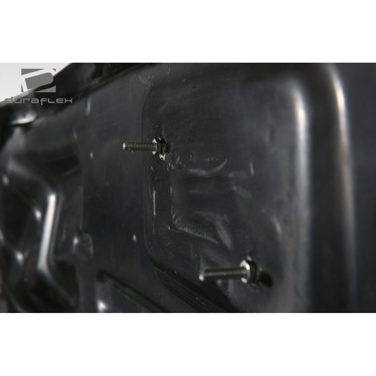 Modify your Ford Mustang 2015 with our Exterior/Hoods - Close up view of cowl hood with screws seen at angle