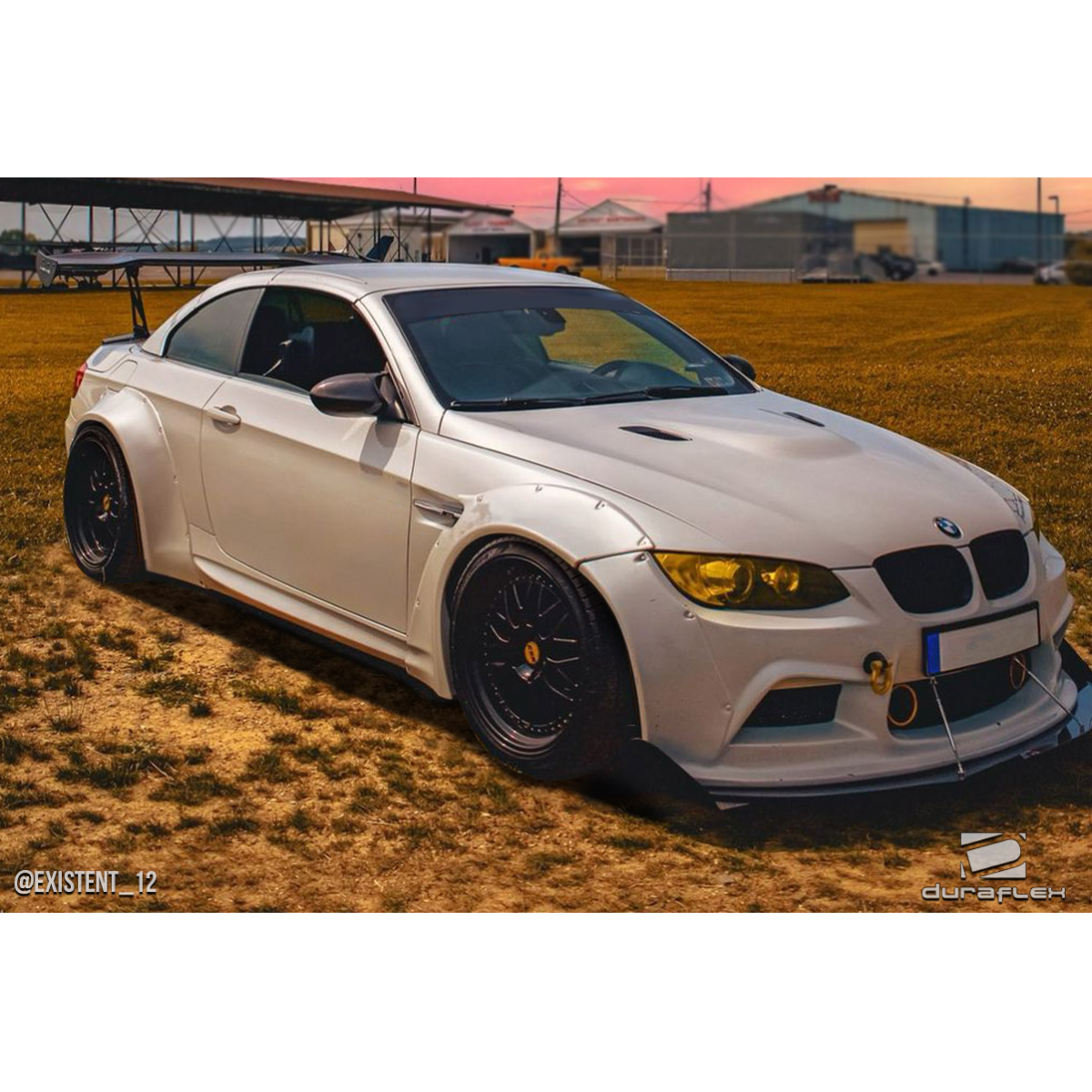 Modify your BMW M3 2008 with our Exterior/Complete Body Kits - Angle shows car from the front left side