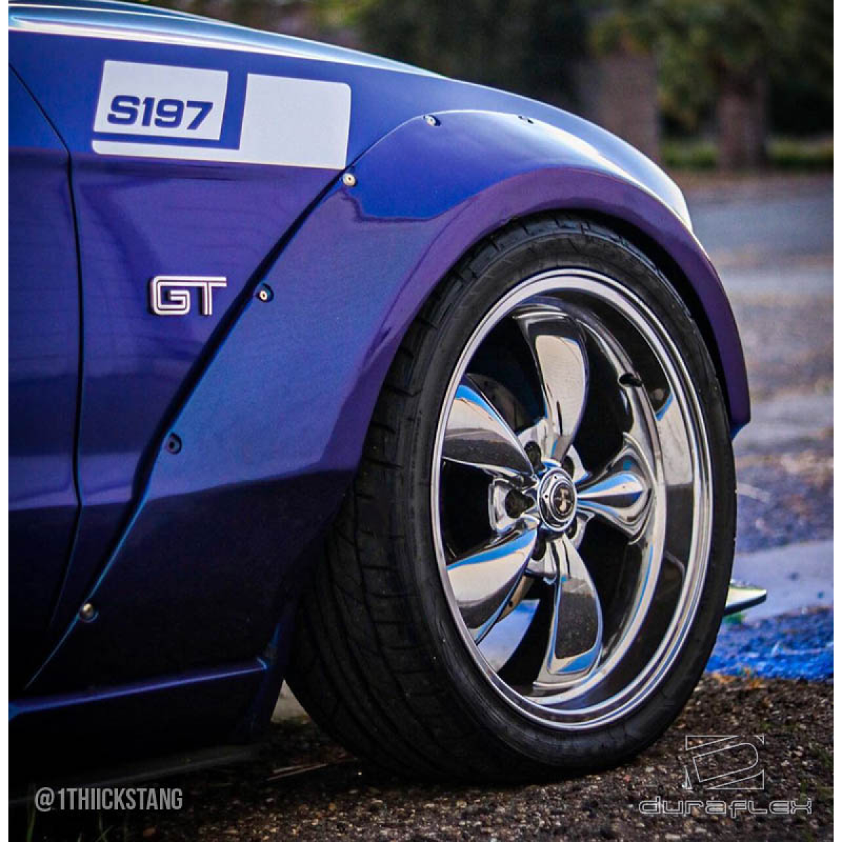 Modify your Ford Mustang 2010 with our Exterior/Complete Body Kits - Profile angle of the car focusing on the fender