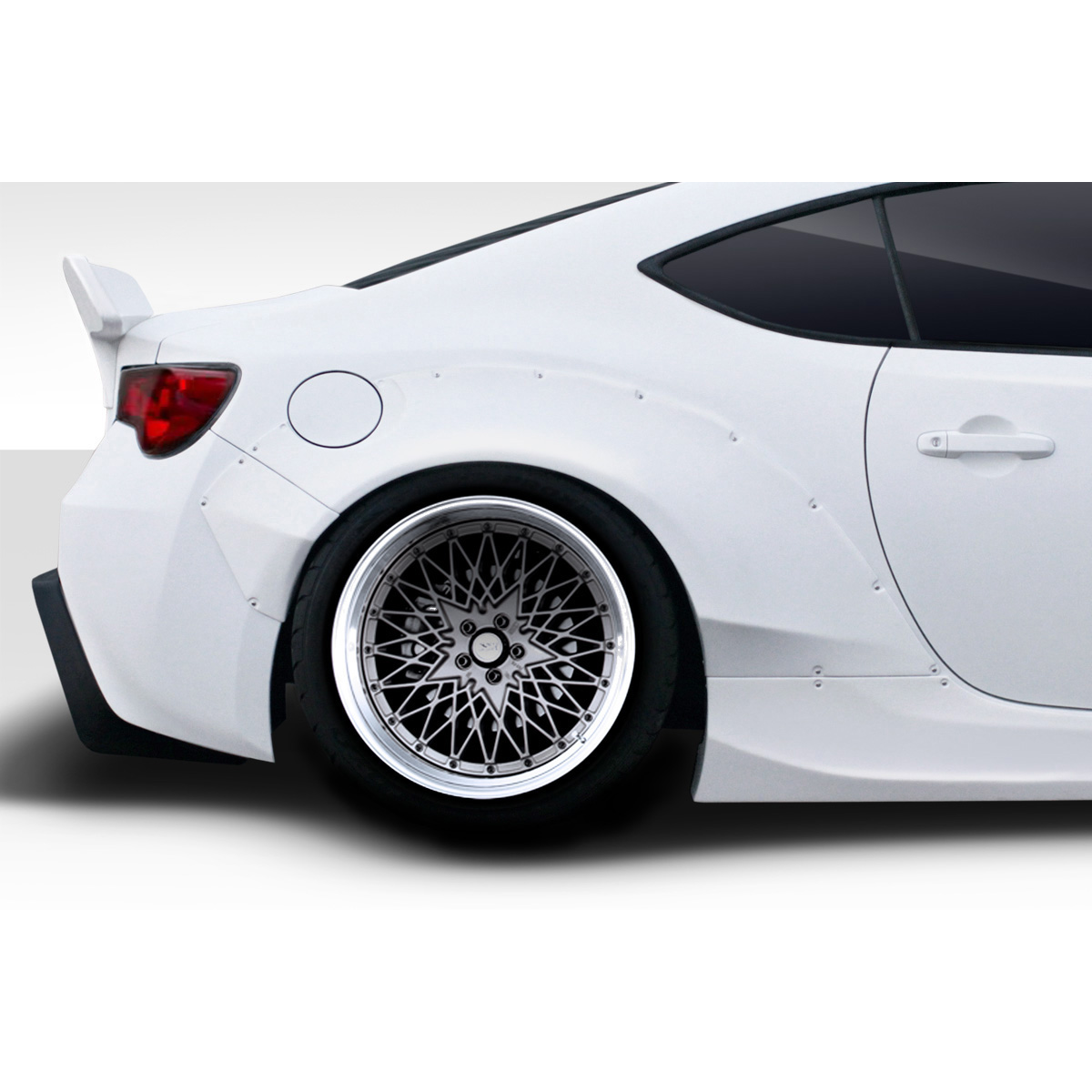 Modify your Subaru BRZ 2013 with our Exterior/Complete Body Kits - Viewed from a low side angle showing the rear wheel