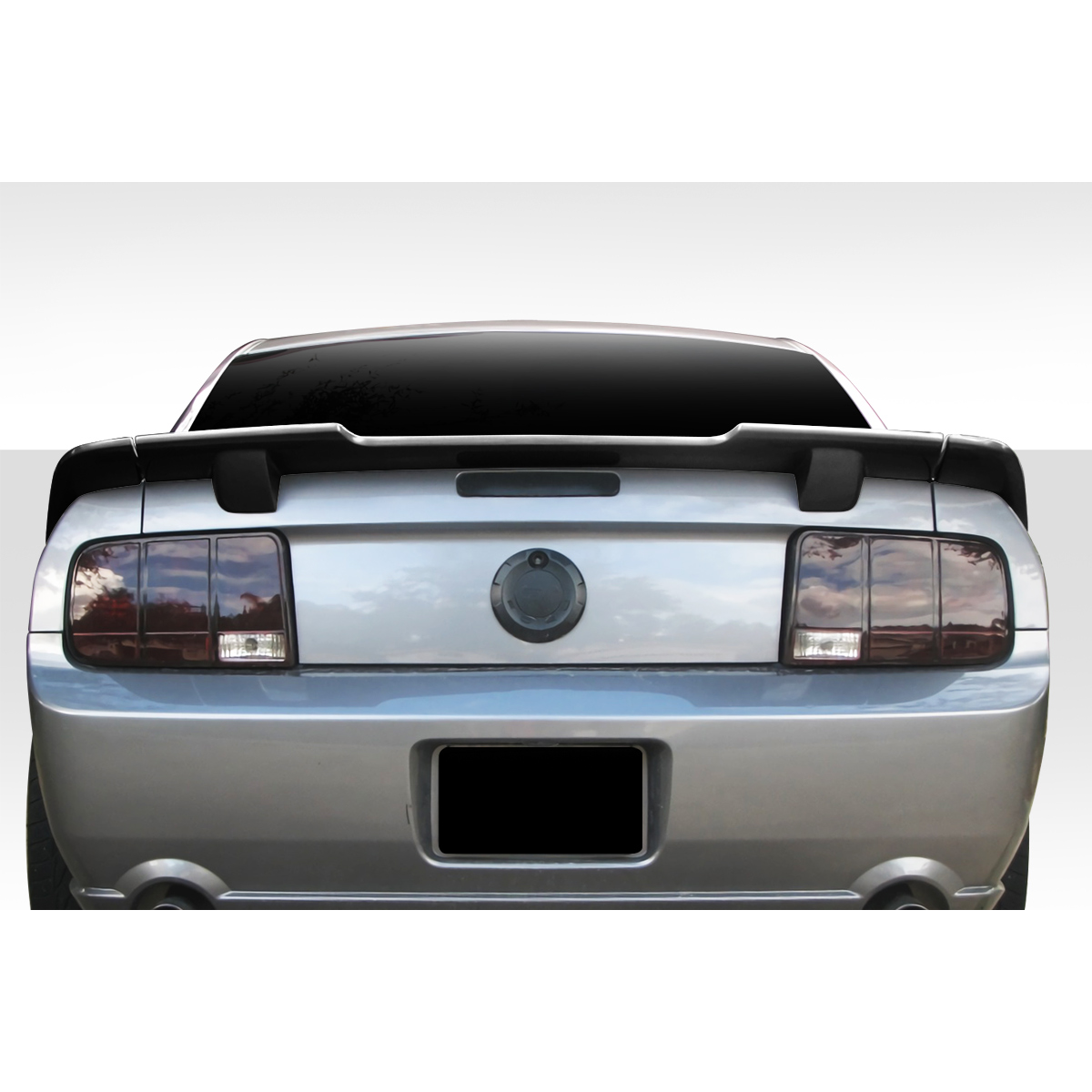 Modify your Ford Mustang 2005 with our Exterior/Wings - Rear view angle of a Ford Mustang car