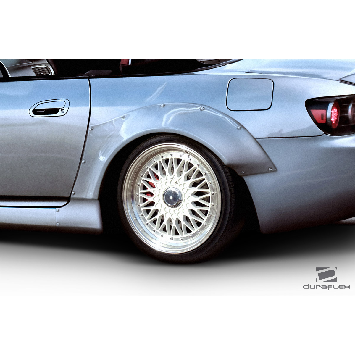 Modify your Honda S2000 2000 with our Exterior/Fenders - Right rear fender at a slight rear angle