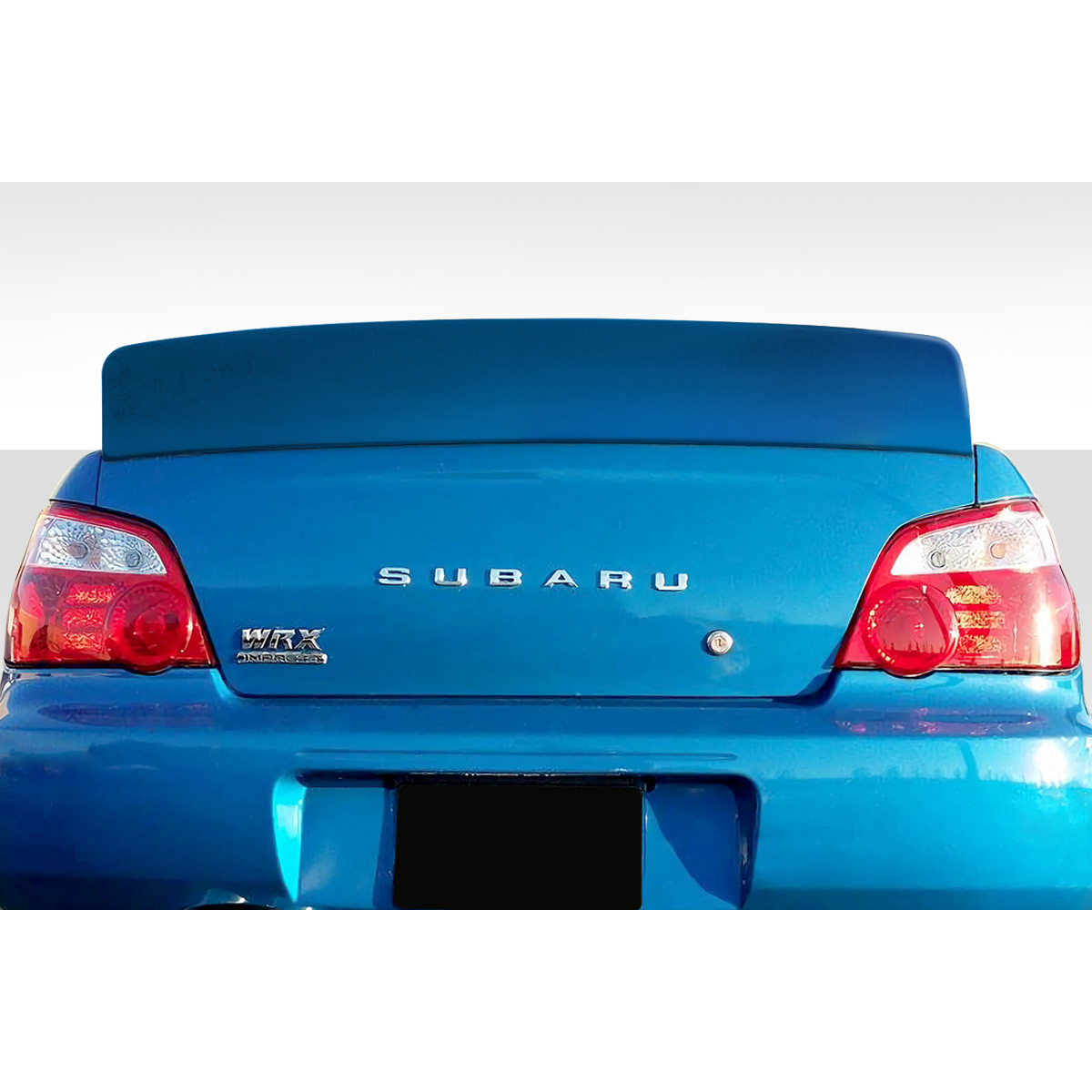 Modify your Subaru Impreza 2002 with our Exterior/Wings - Rear view of the vehicle with spoiler visible