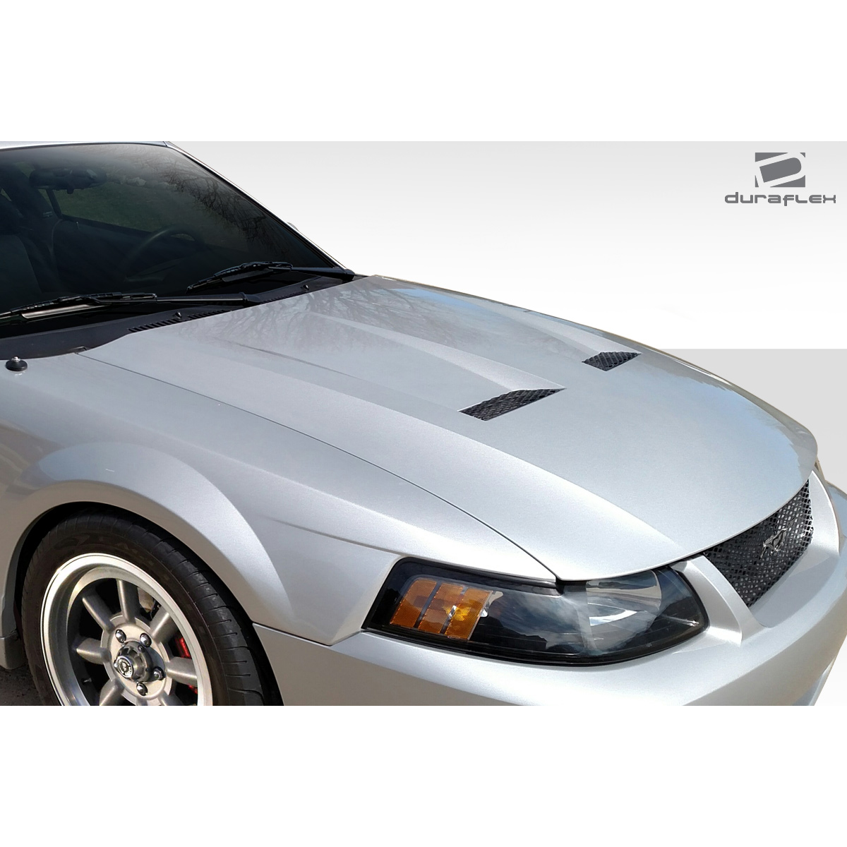 Modify your Ford Mustang 1999 with our Exterior/Hoods - The part is viewed from a front angle