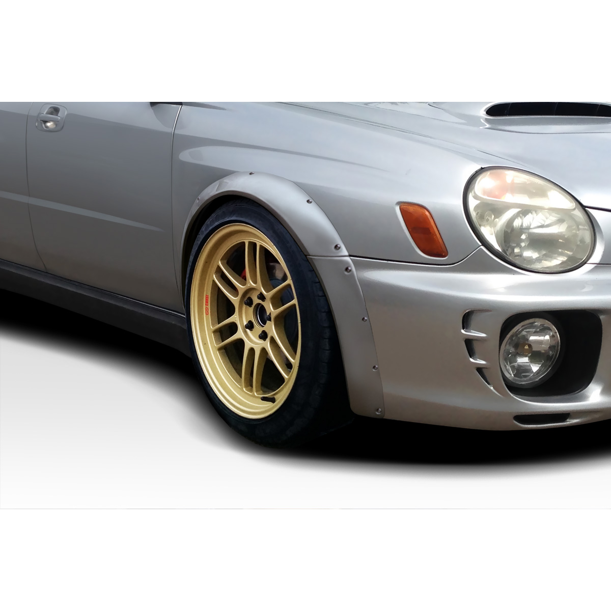 Modify your Subaru Impreza 2002 with our Exterior/Fenders - Front angled view of fender flares on Subaru Impreza