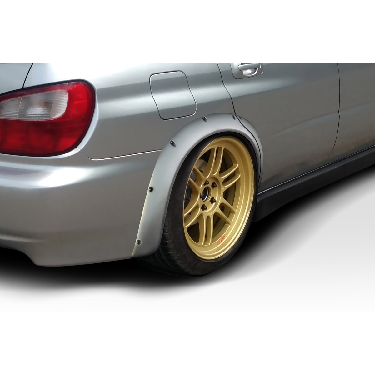 Modify your Subaru Impreza 2004 with our Exterior/Fenders - Side angle view of fender flare on vehicle