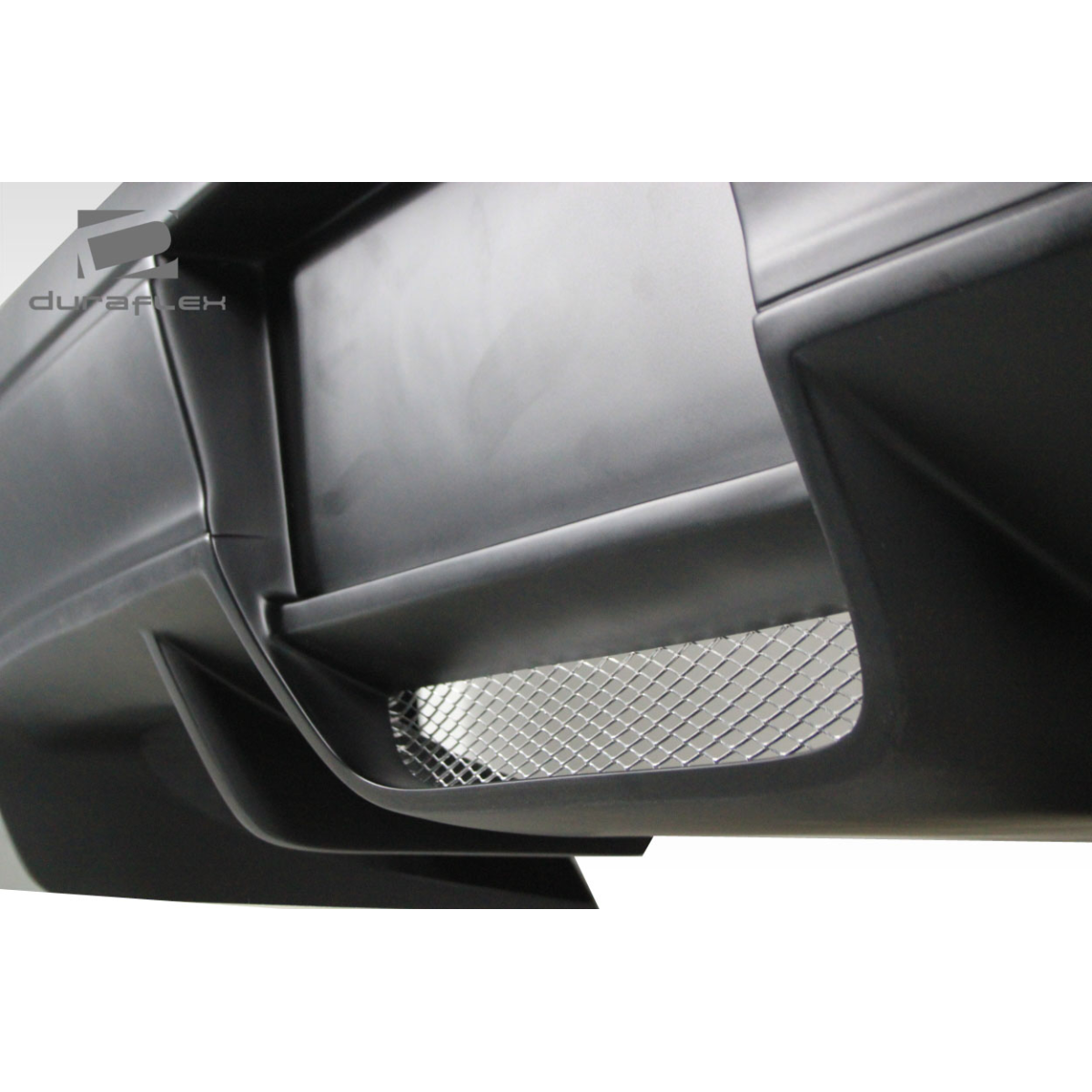 Modify your Nissan 300ZX 1990 with our Exterior/Rear Bumpers or Lips - Image is shown from a low angled perspective