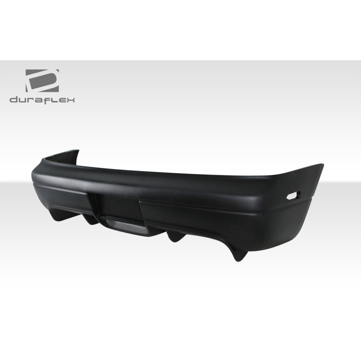 Modify your Nissan 300ZX 1990 with our Exterior/Rear Bumpers or Lips - Rear view of the bumper at a slight angle