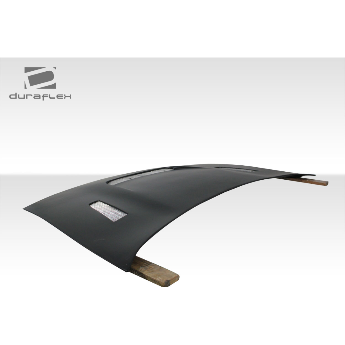 Modify your Nissan 300ZX 1990 with our Exterior/Hoods - Angled view of automotive hood on wooden base