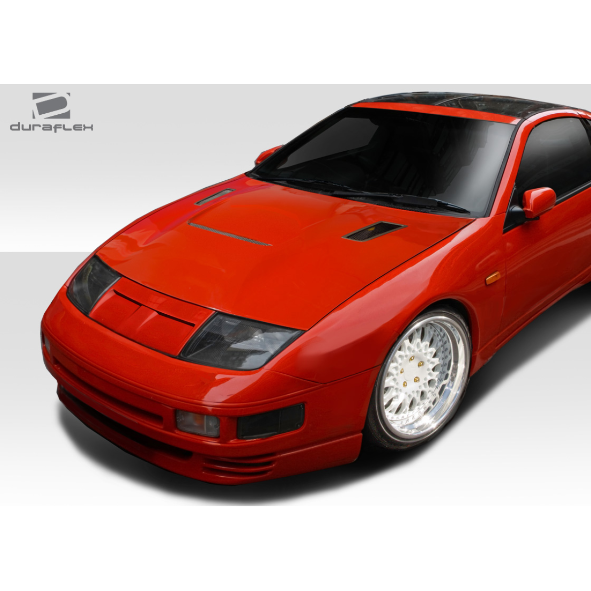 Modify your Nissan 300ZX 1990 with our Exterior/Grilles - The image shows a front angled view of the car