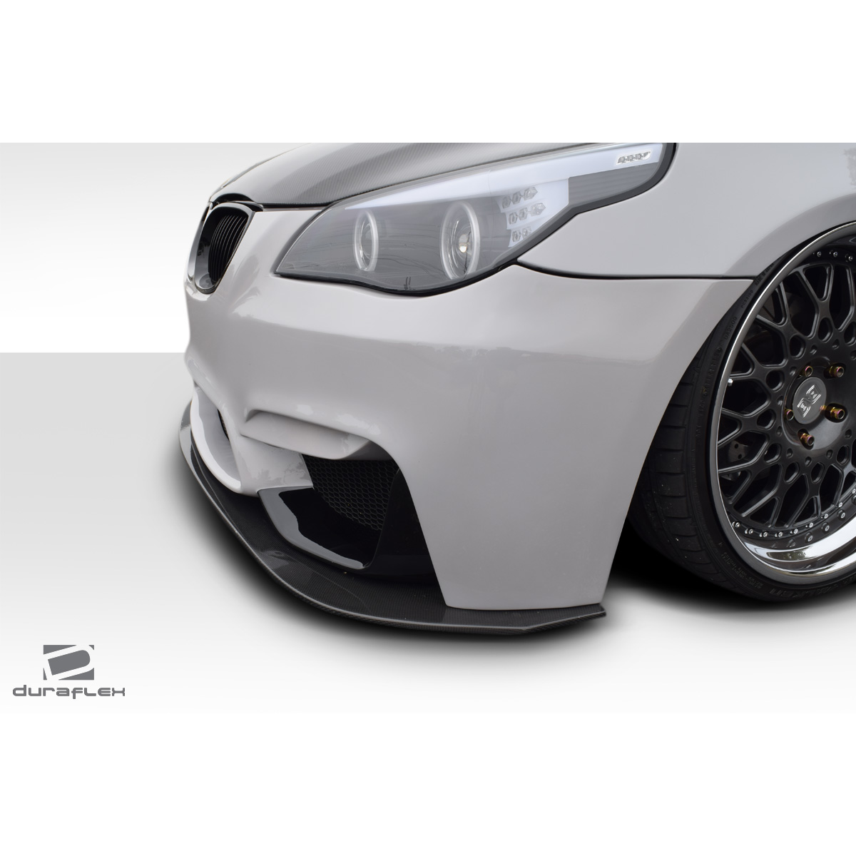 Modify your BMW 5-Series 2004 with our Exterior/Front Bumpers or Lips - Front angle showcasing front bumper design