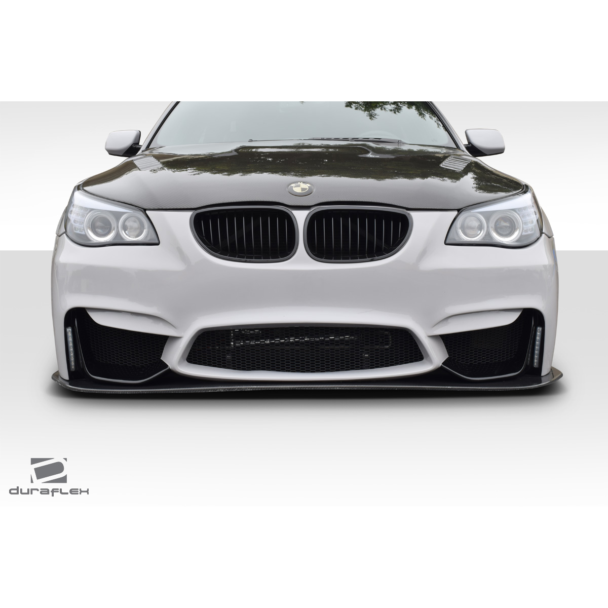 Modify your BMW 5-Series 2004 with our Exterior/Front Bumpers or Lips - Front view showing a low angle perspective