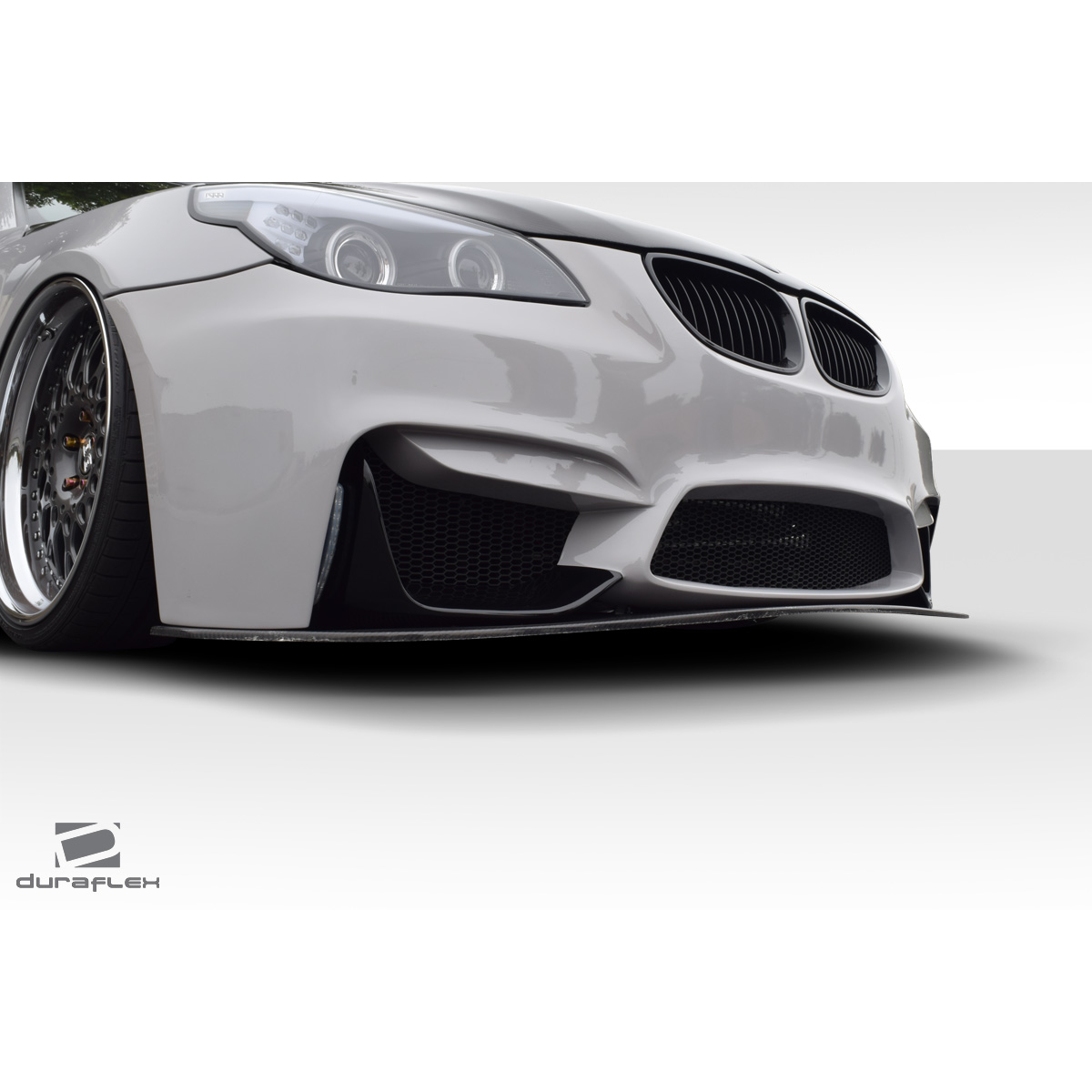 Modify your BMW 5-Series 2004 with our Exterior/Front Bumpers or Lips - Low angle view of front bumper details