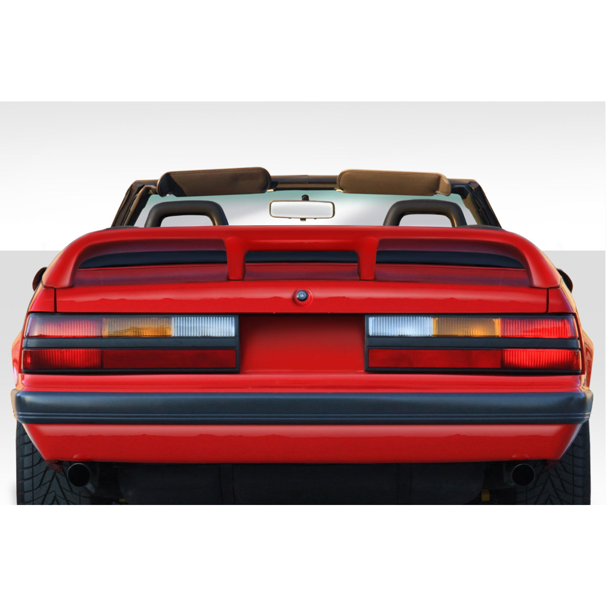 Modify your Ford Mustang 1979 with our Exterior/Wings - Rear view angle of a convertible car