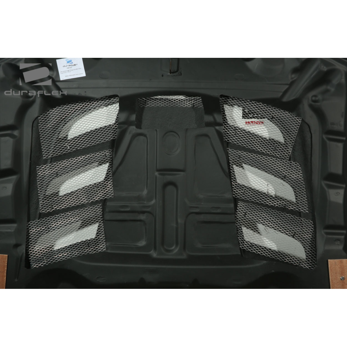 Modify your Dodge Charger 2011 with our Exterior/Hoods - Angled view of hood showing mesh design