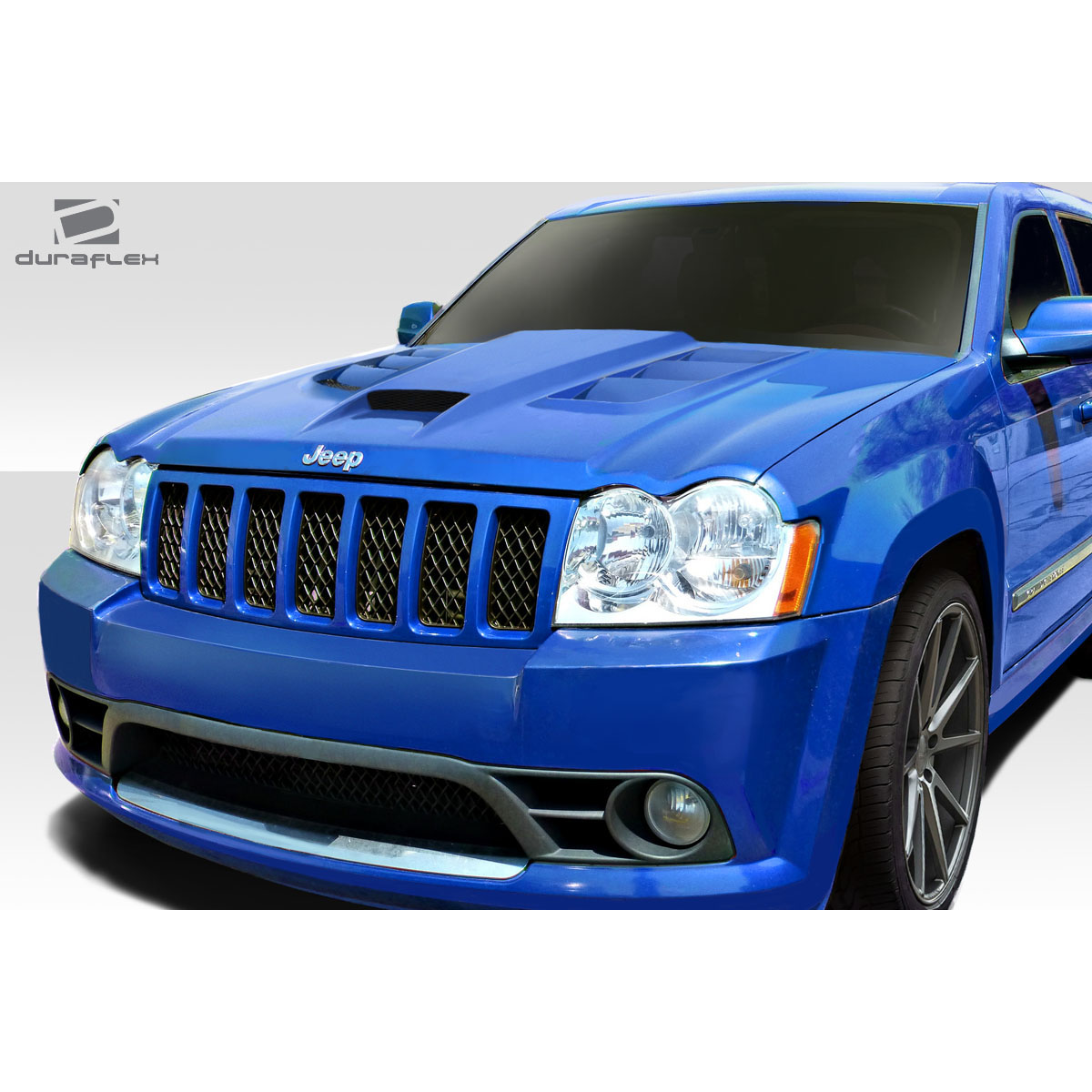 Modify your Jeep Cherokee 2005 with our Exterior/Hoods - Front angle view of the Jeep Grand Cherokee