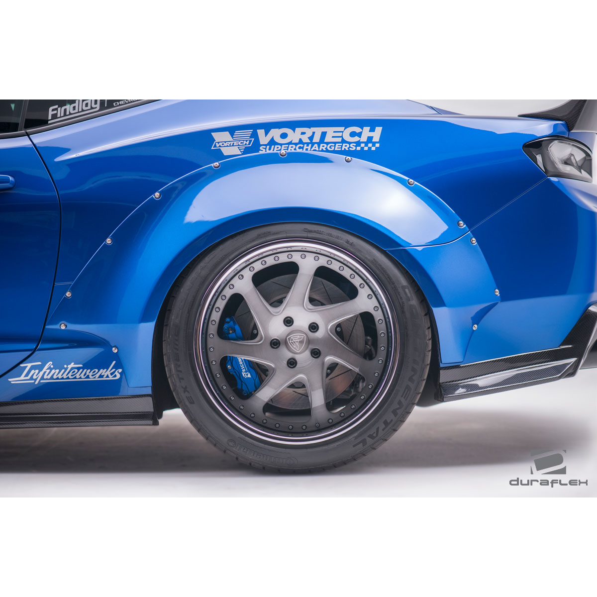 Modify your Chevrolet Camaro 2016 with our Exterior/Complete Body Kits - Side view angled shot of rear fender and wheel