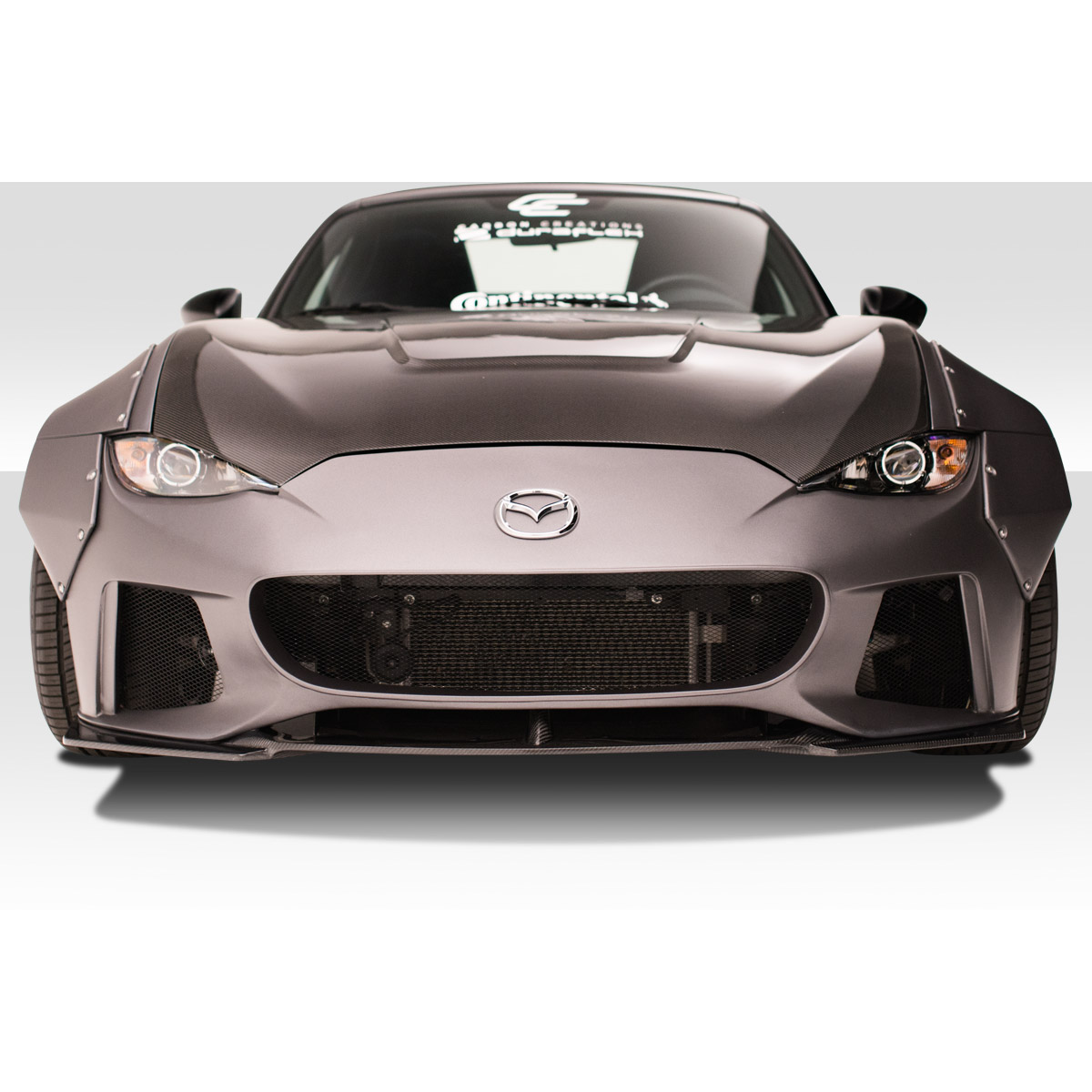 Modify your Mazda Miata 2016 with our Exterior/Front Bumpers or Lips - Front view of car showing bumper design clearly