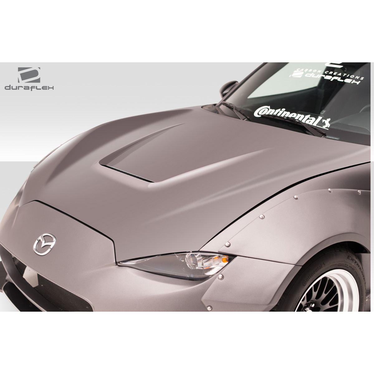 Modify your Mazda Miata 2016 with our Exterior/Hoods - Showing front angled view of the car hood